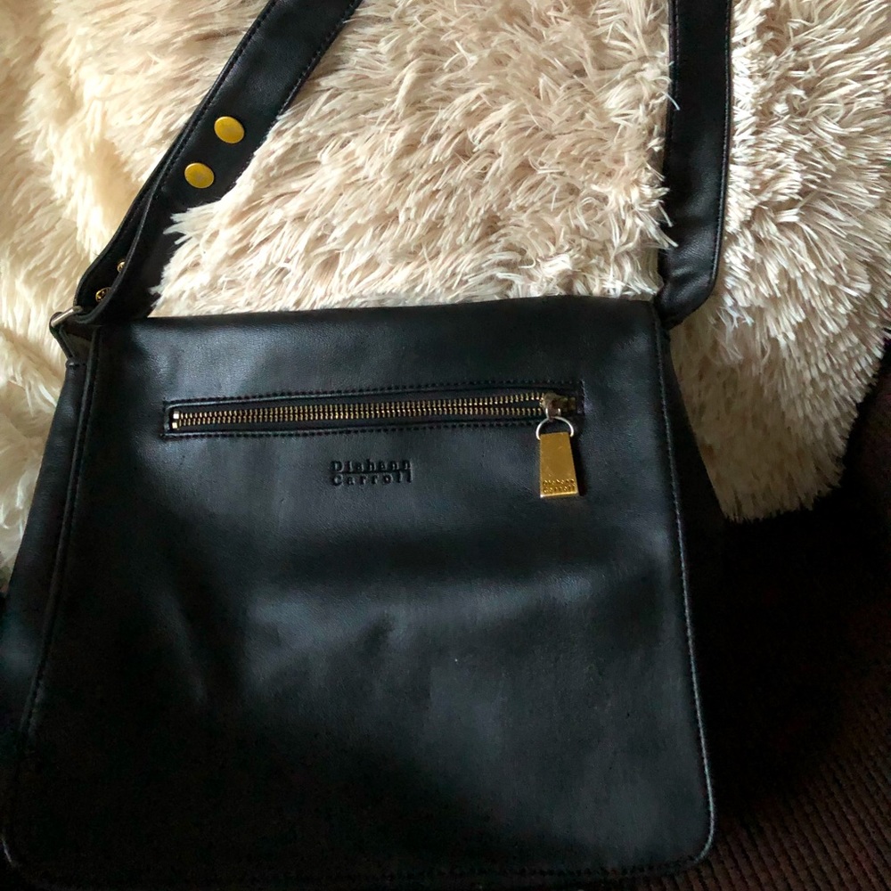 This is a beautiful Diahann Carroll black purse.